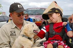 Liam, Craig and Hero the assistance dog