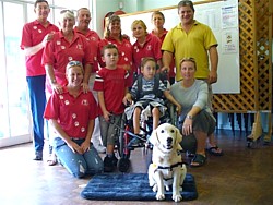 Liam and Hero the assistance dog with the Aussie Pooch Mobile Team.